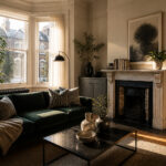 Interior of a Victorian terrace featuring warm neutral colors and original architectural details.